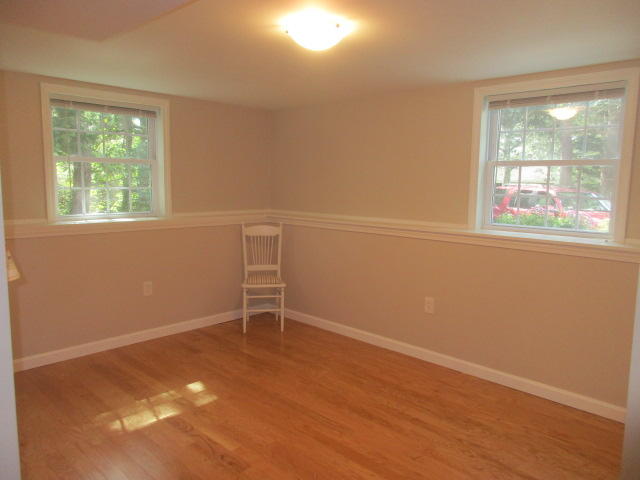 4 Stage Coach Road Harwich, MA 02645 - Photo 18 of 34 an empty room with windows