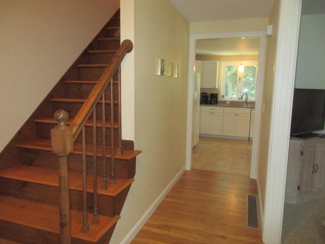 4 Stage Coach Road Harwich, MA 02645 - Photo 23 of 34 a view of entryway and hall with wooden floor