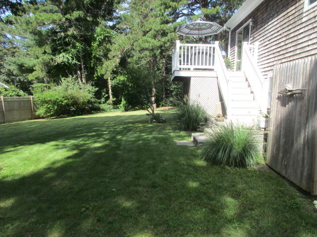4 Stage Coach Road Harwich, MA 02645 - Photo 29 of 34 a front view of a house with a garden
