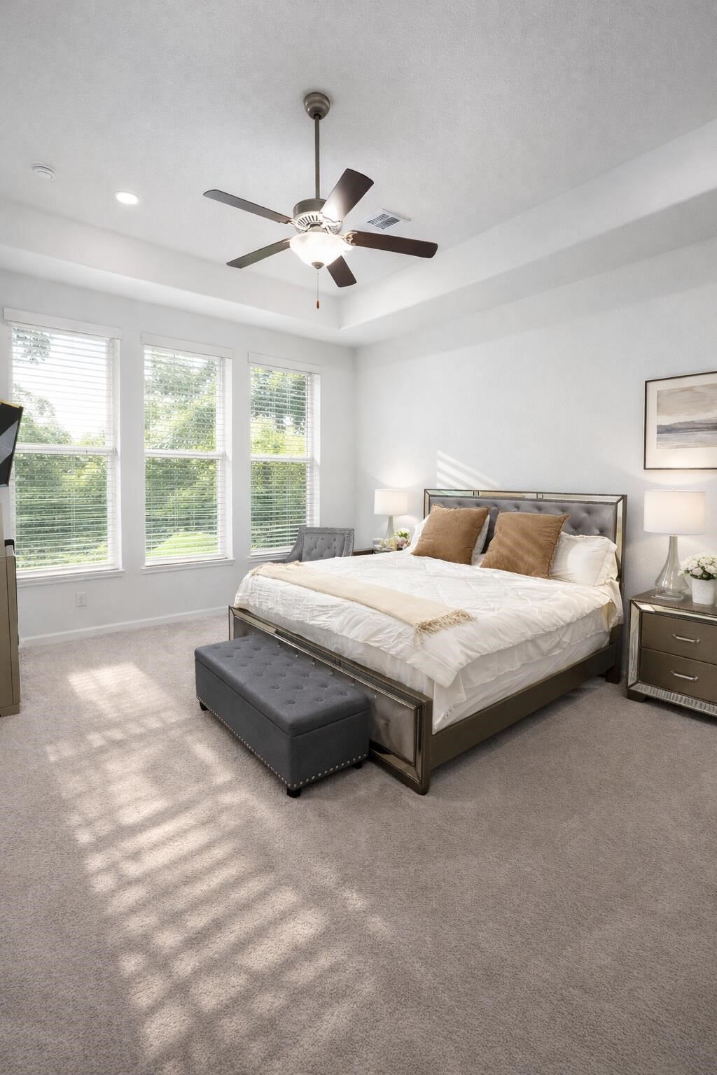 4334 Redford Valley Road Rosharon, TX 77583 - Photo 32 of 44 a bedroom with a large bed and a large window