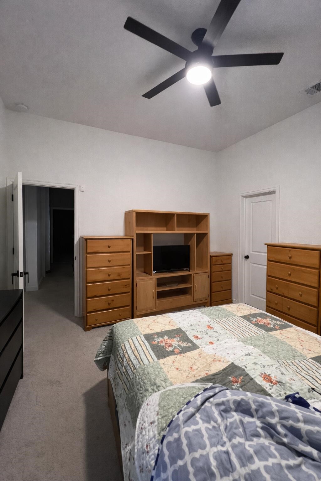 4334 Redford Valley Road Rosharon, TX 77583 - Photo 41 of 44 a bedroom with a bed and a television