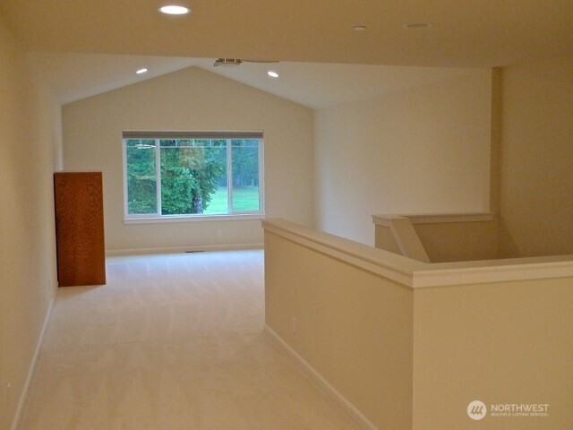 160 East Soderberg Road, Unit H23 Allyn, WA 98524 - Photo 13 of 20 a view of an empty room with a window
