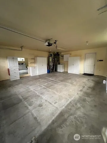 a view of a house with backyard and porch