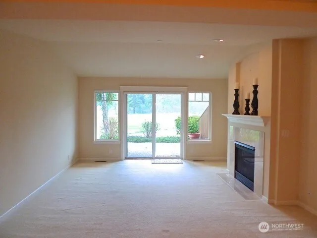 a view of a room with a large window