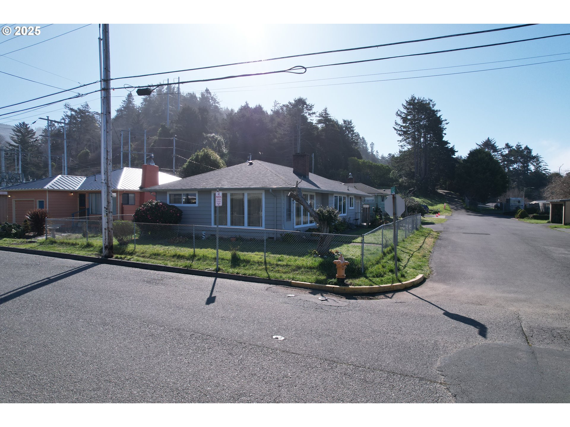 29545 Bailor Street Gold Beach, OR 97444 - Photo 11 of 48 a house view with a garden space