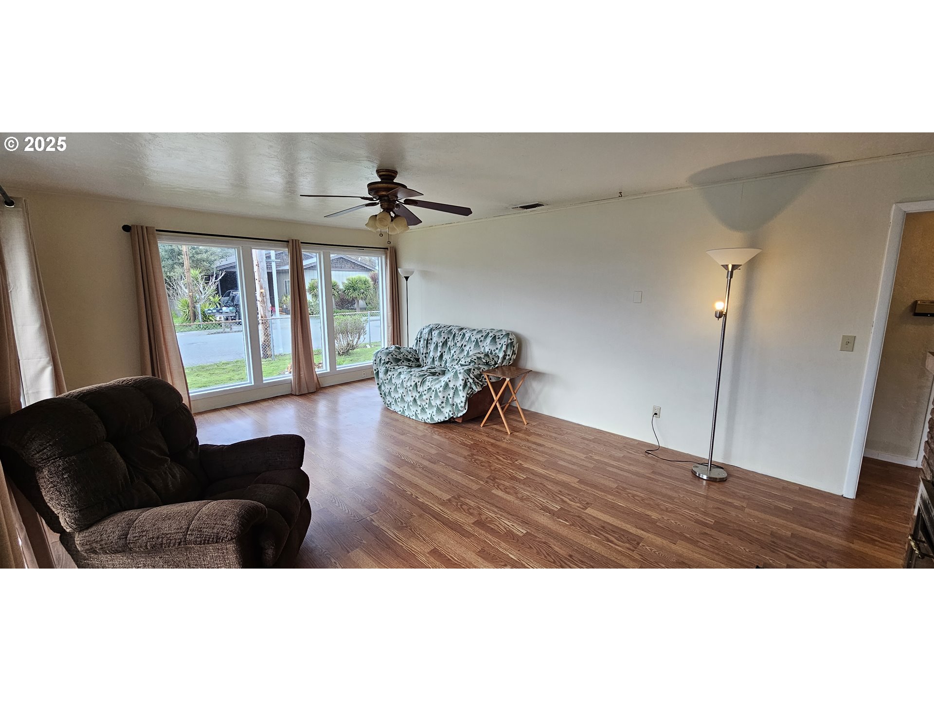 29545 Bailor Street Gold Beach, OR 97444 - Photo 15 of 48 a living room with furniture and a window