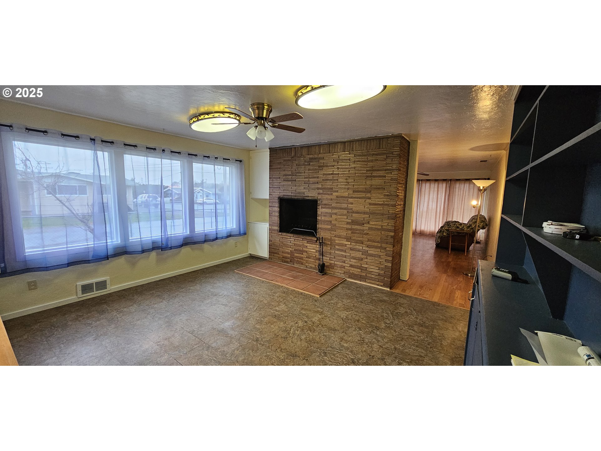 29545 Bailor Street Gold Beach, OR 97444 - Photo 18 of 48 a view of an empty room with wooden floor