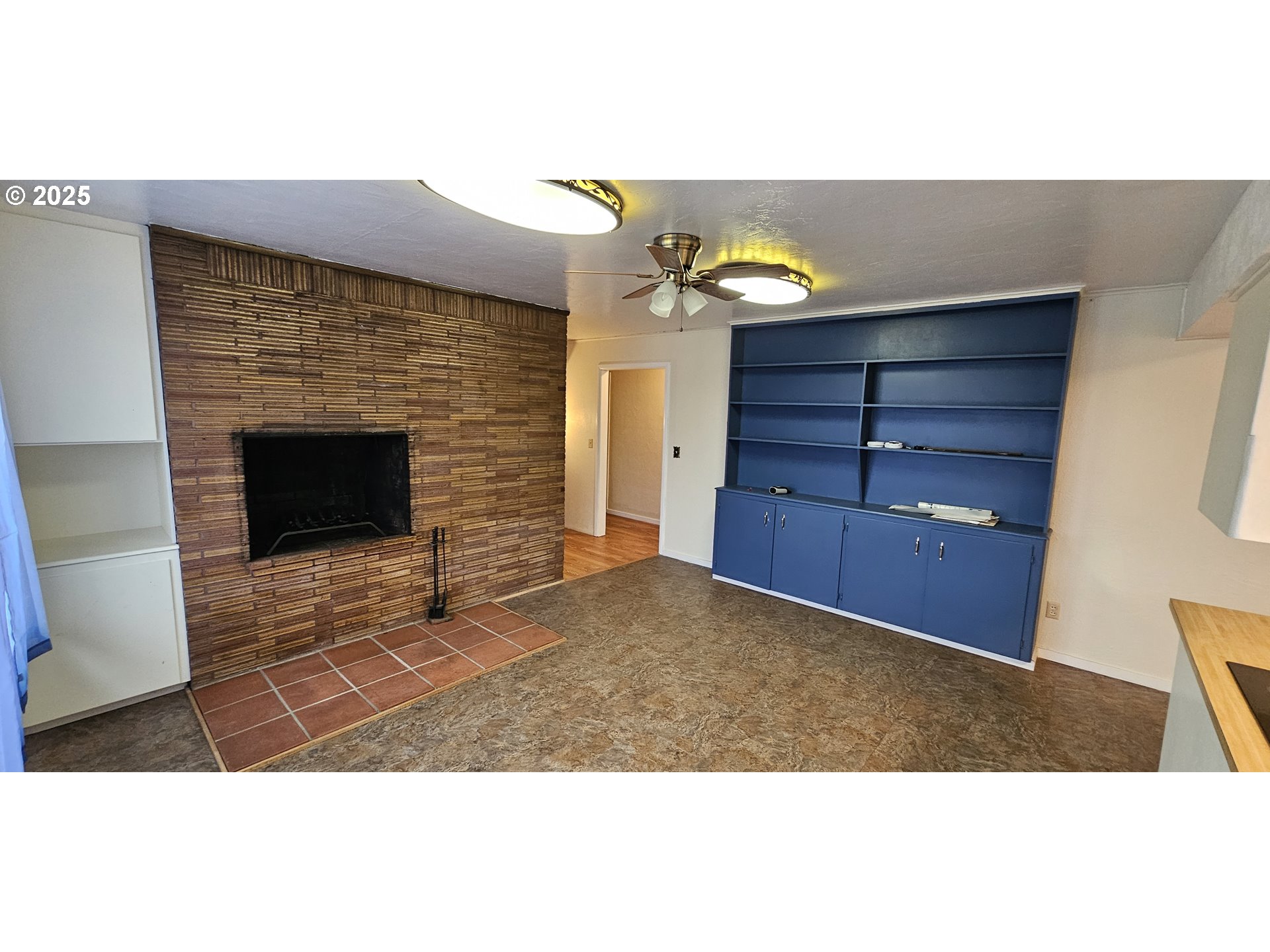 29545 Bailor Street Gold Beach, OR 97444 - Photo 19 of 48 a view of an empty room and wooden floor