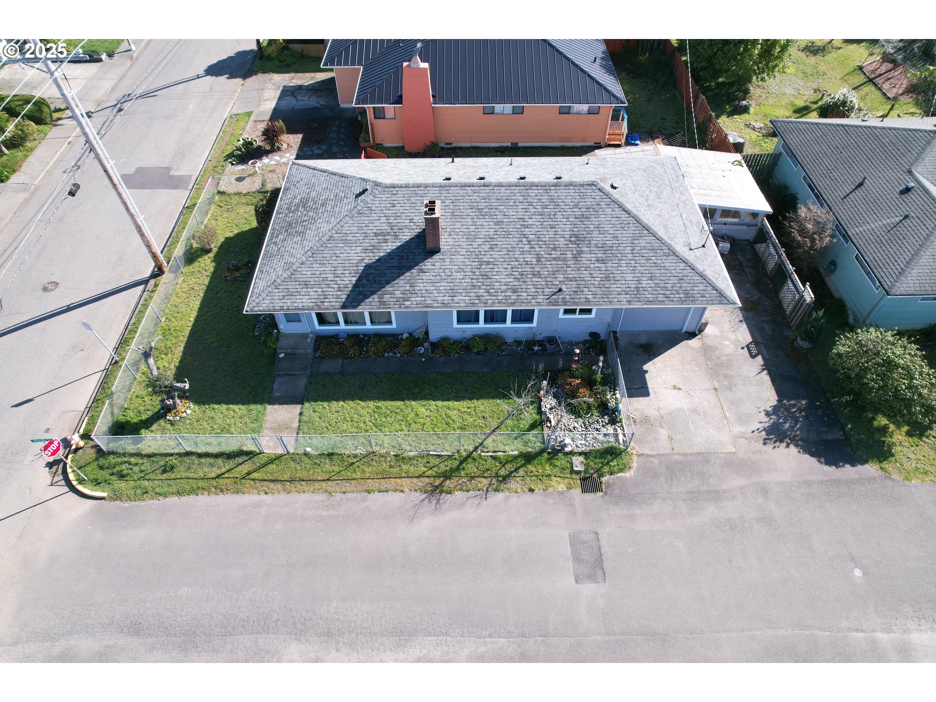 29545 Bailor Street Gold Beach, OR 97444 - Photo 3 of 48 a aerial view of a house with a yard and potted plants