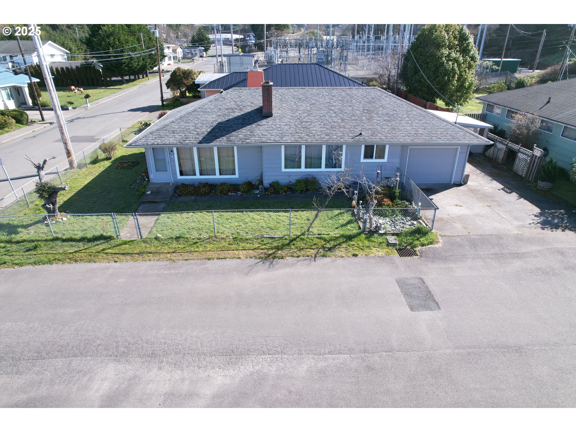 29545 Bailor Street Gold Beach, OR 97444 - Photo 4 of 48 a aerial view of a house with a yard and potted plants