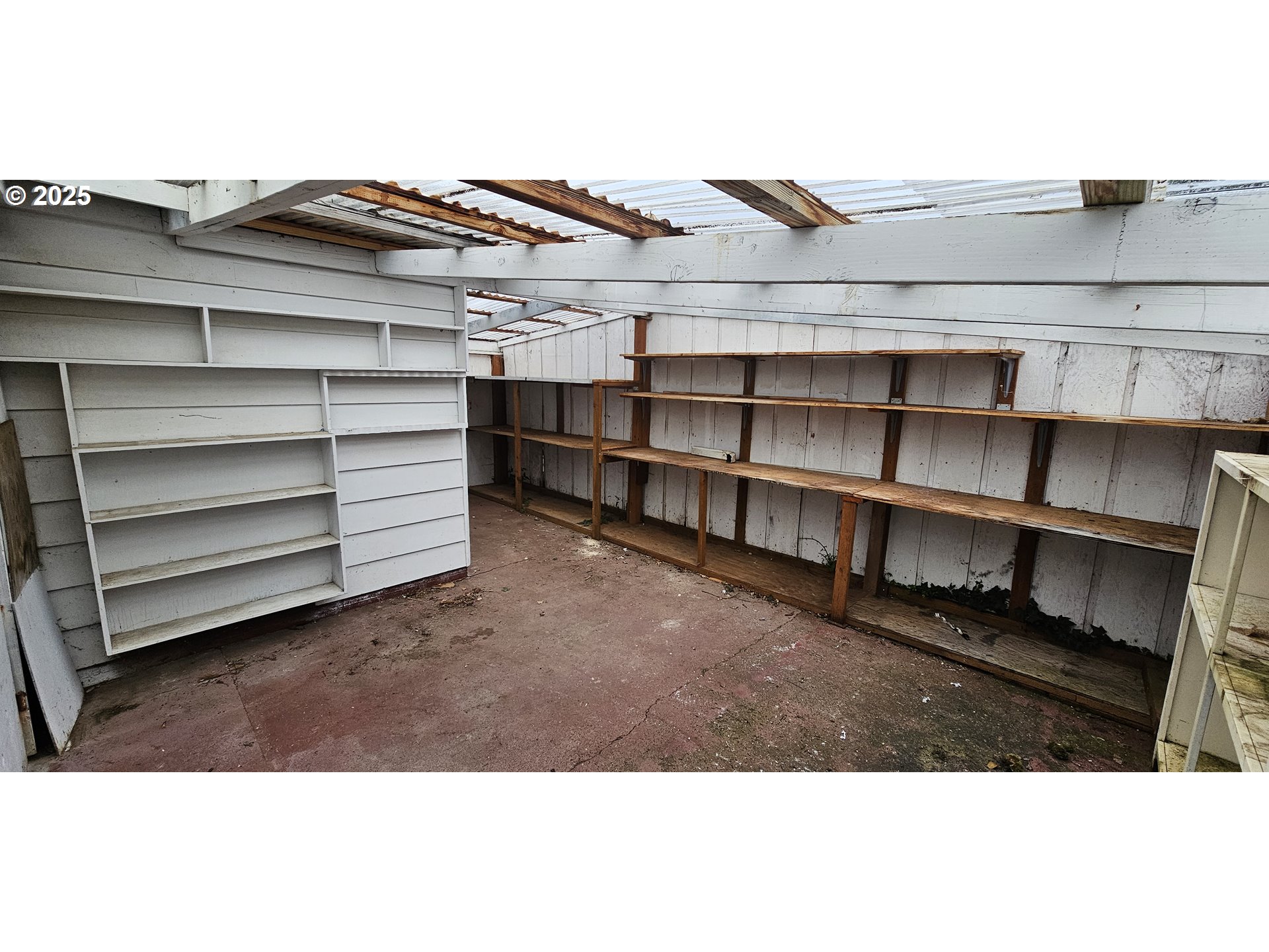 29545 Bailor Street Gold Beach, OR 97444 - Photo 43 of 48 a view of a living room that has a rug and a chair