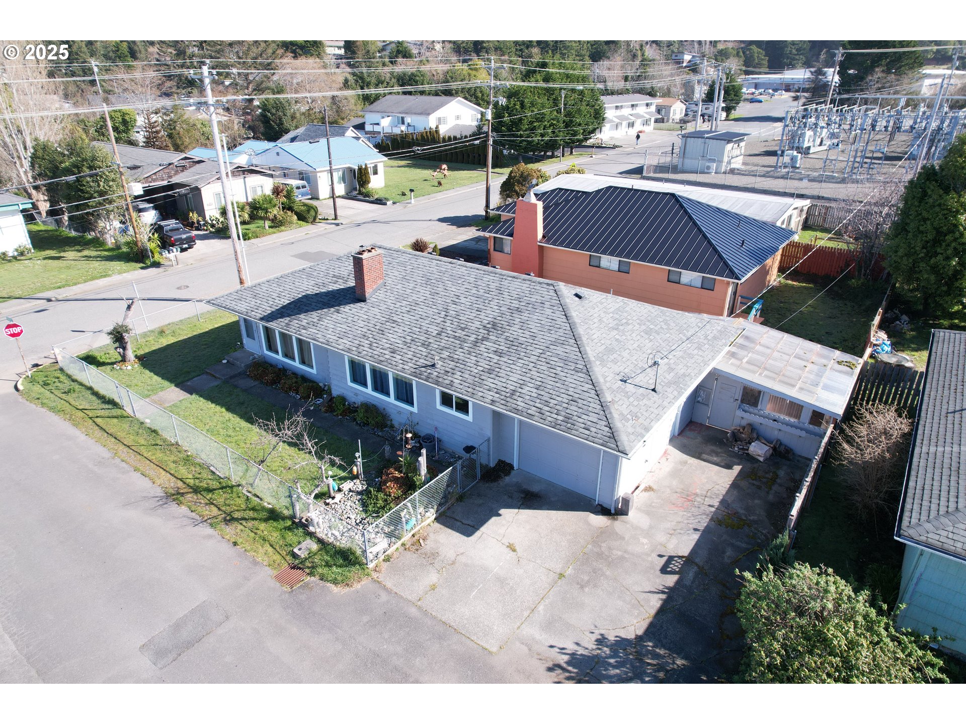 29545 Bailor Street Gold Beach, OR 97444 - Photo 5 of 48 an aerial view of a house with a yard basket ball court and outdoor seating