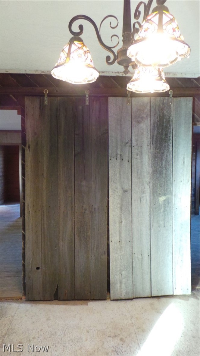 2055 Buffalo Run Road Rockport, WV 26169 - Photo 15 of 20 This picture shows the doors open and pushed together so you can see in the back rooms of the home.