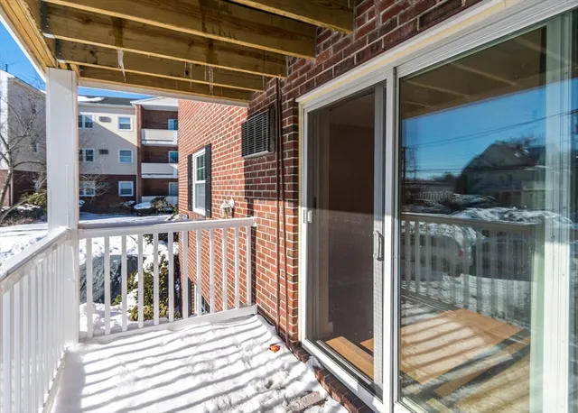 a view of a balcony with a door
