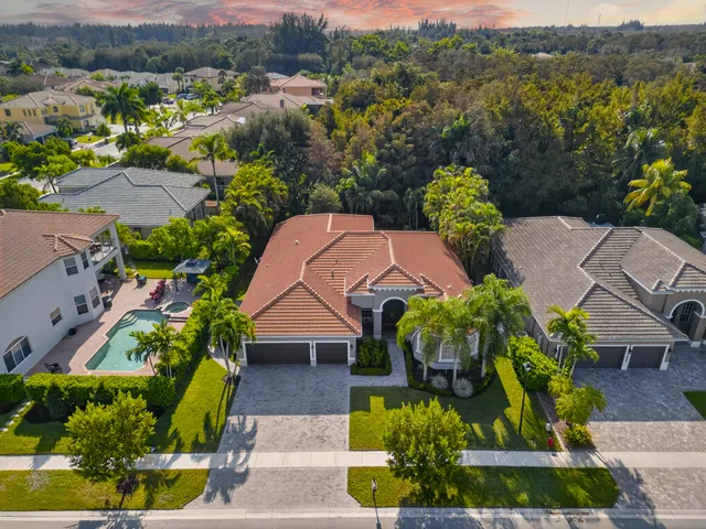 an aerial view of a house with a garden