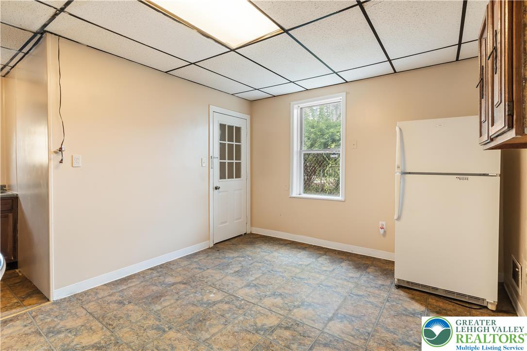 339 East Howe Street Allentown, PA 18109 - Photo 11 of 35 a view of a room with a refrigerator and window