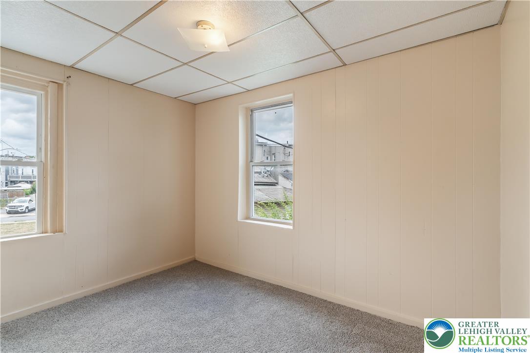 339 East Howe Street Allentown, PA 18109 - Photo 18 of 35 an empty room with windows