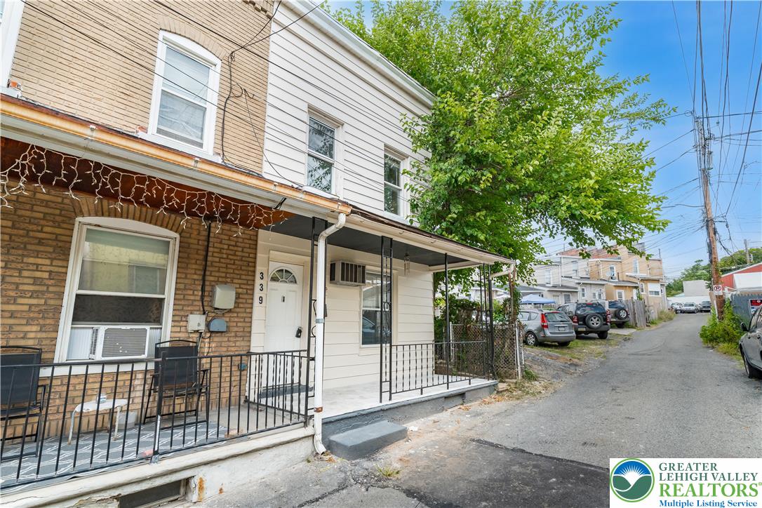 339 East Howe Street Allentown, PA 18109 - Photo 2 of 35 a view of a house with a porch and furniture