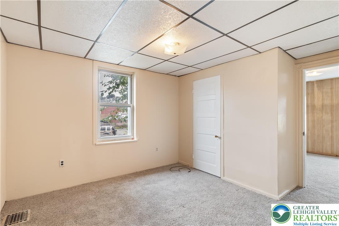 339 East Howe Street Allentown, PA 18109 - Photo 21 of 35 a view of a room with window and a ceiling fan
