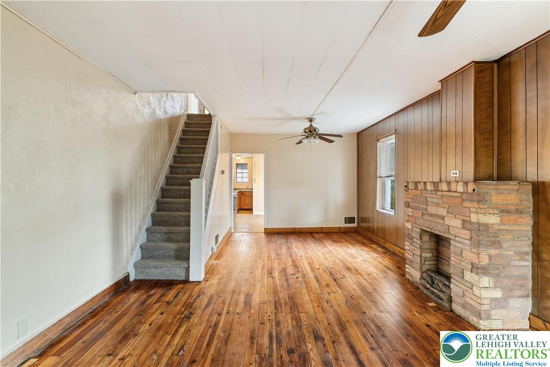 339 East Howe Street Allentown, PA 18109 - Photo 6 of 35 a view of an empty room with wooden floor and a window