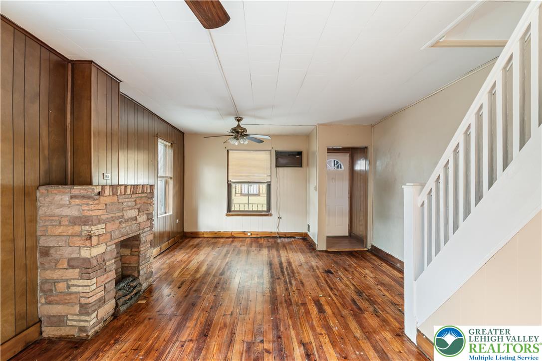 339 East Howe Street Allentown, PA 18109 - Photo 7 of 35 a view of livingroom with hardwood floor and hallway