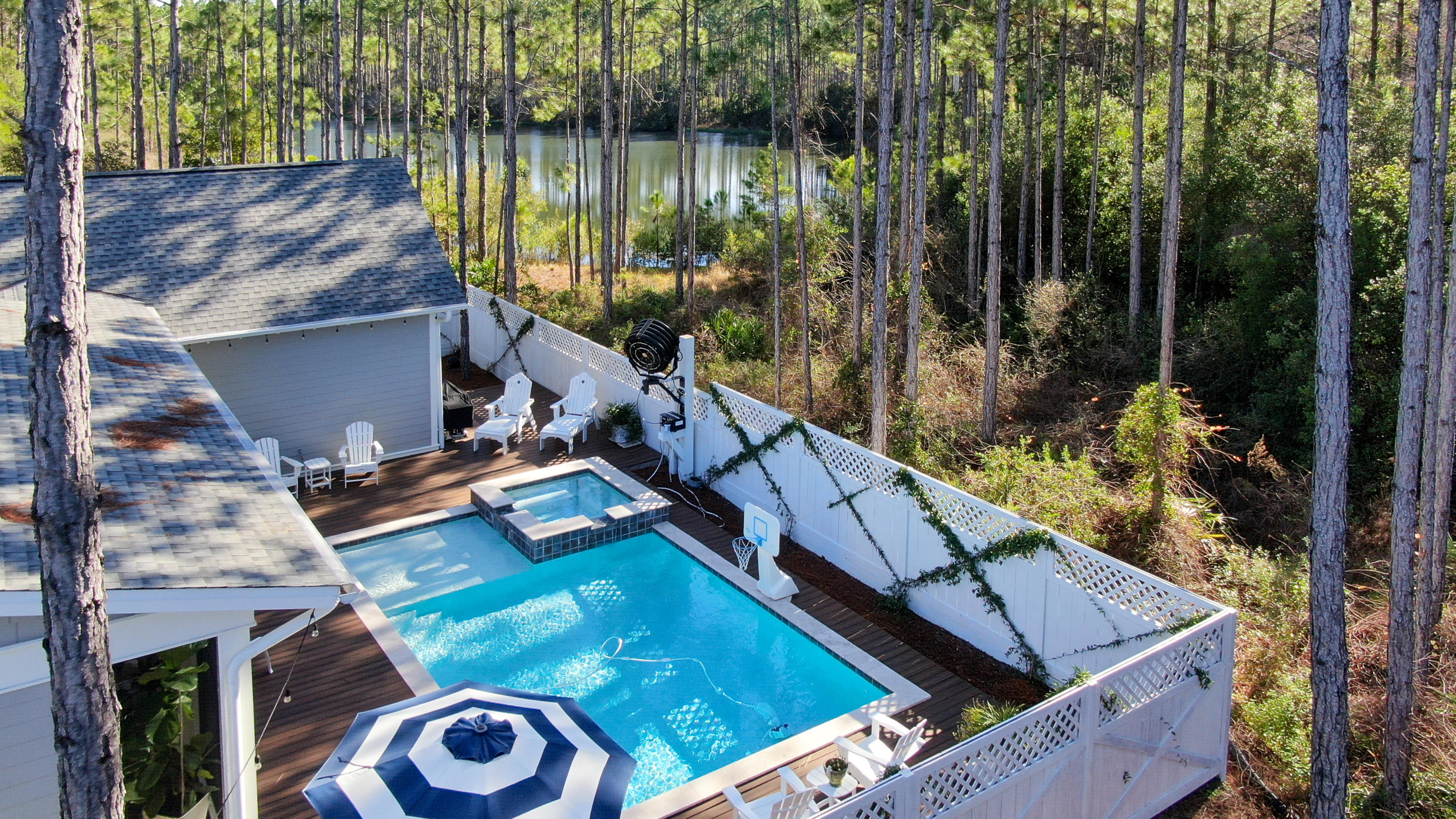 a view of a wooden deck and a lake view