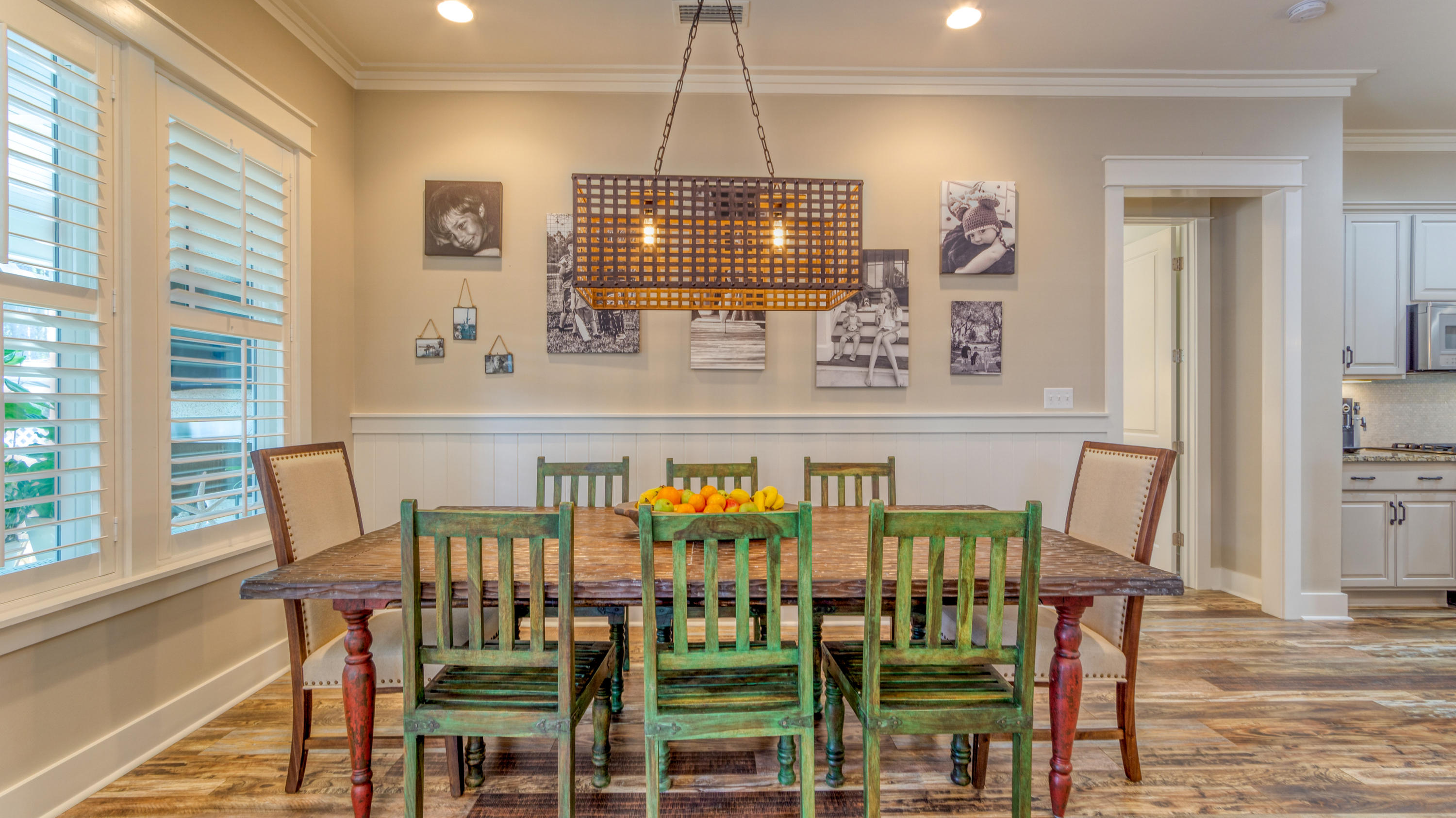 399 Medley Street Watersound, FL 32461 - Photo 12 of 30 a view of a dining room with furniture window and wooden floor