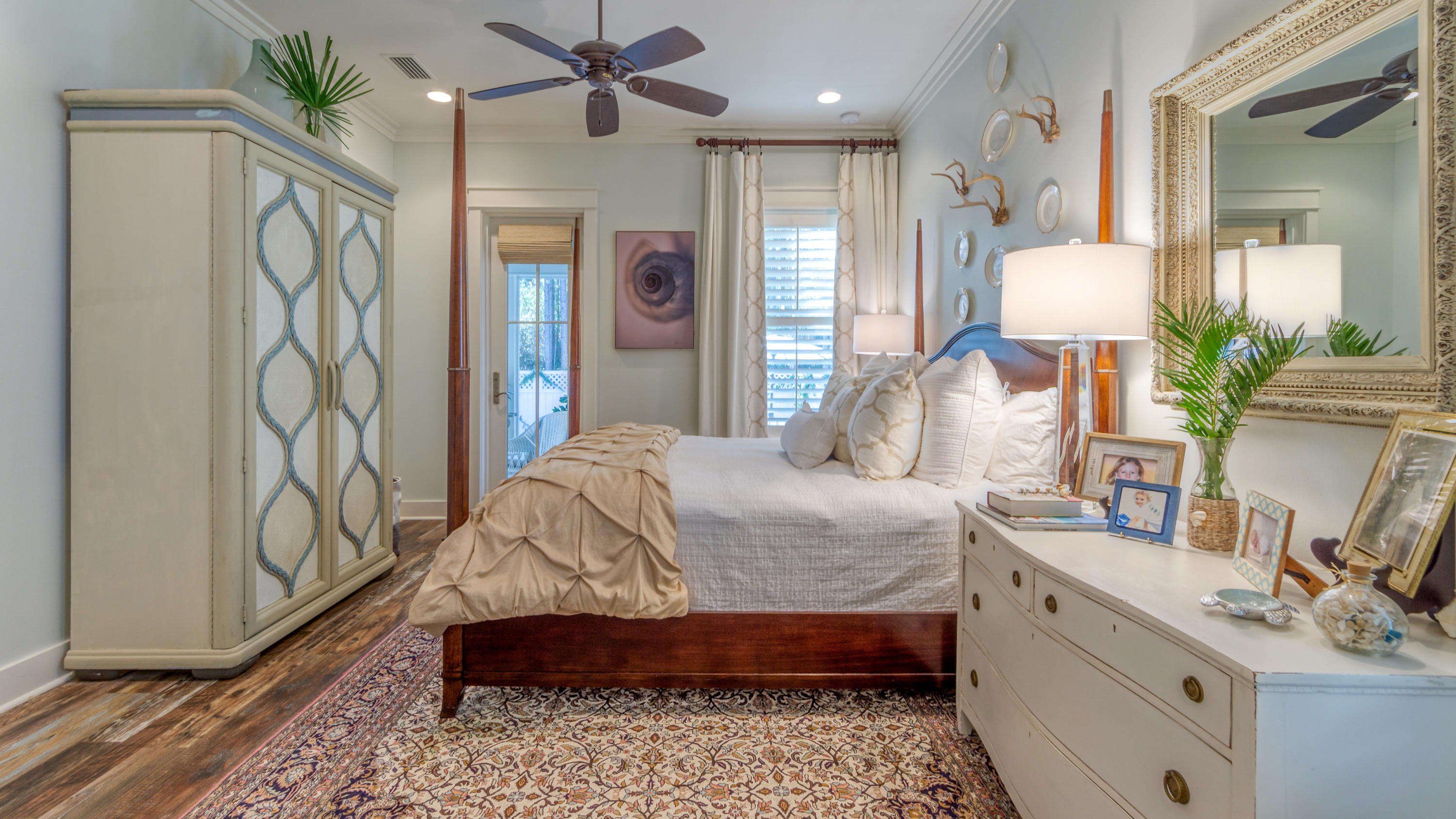 399 Medley Street Watersound, FL 32461 - Photo 24 of 30 a bedroom with a bed dresser and a window