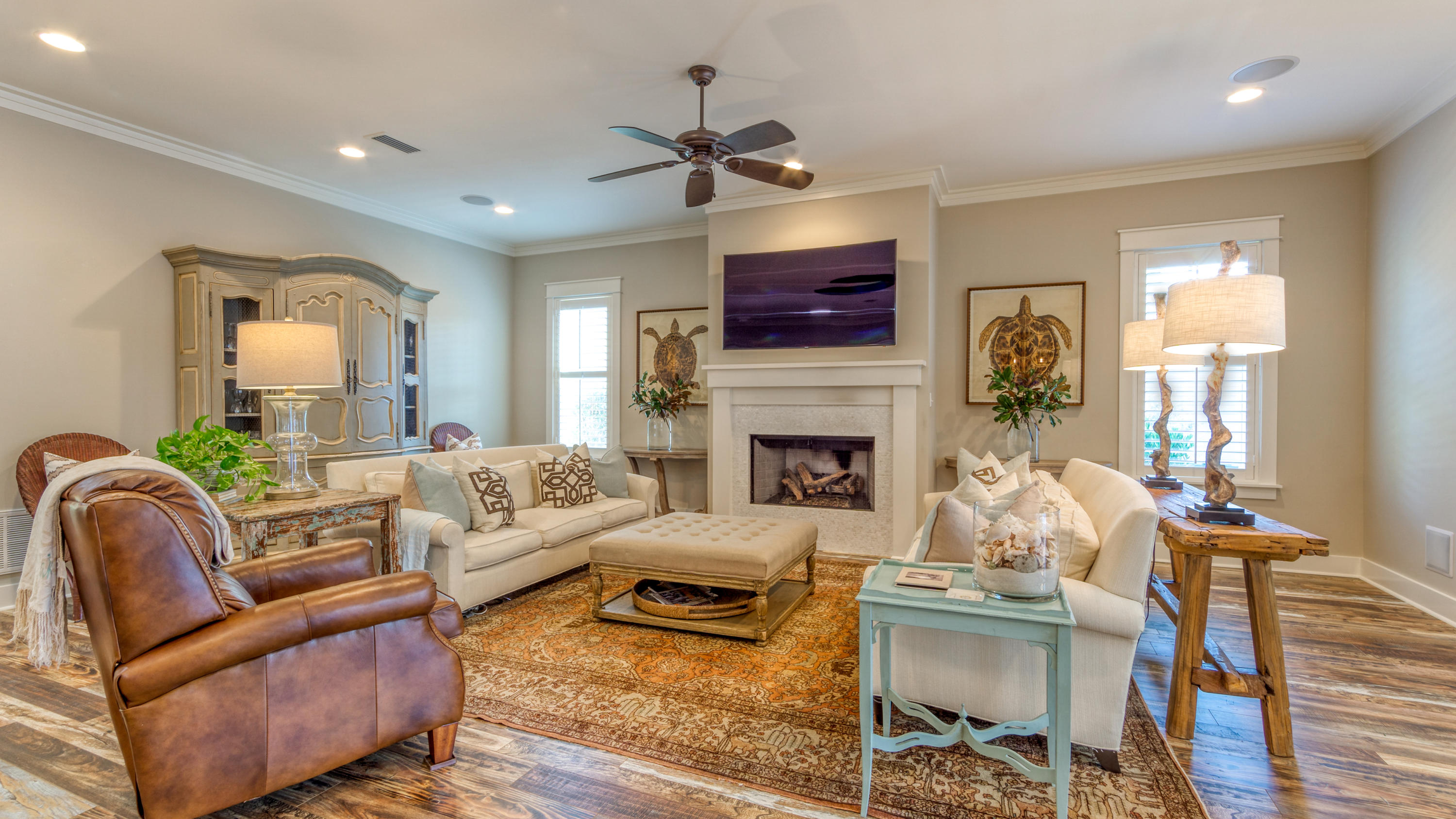 399 Medley Street Watersound, FL 32461 - Photo 10 of 30 a living room with furniture fireplace and a flat screen tv