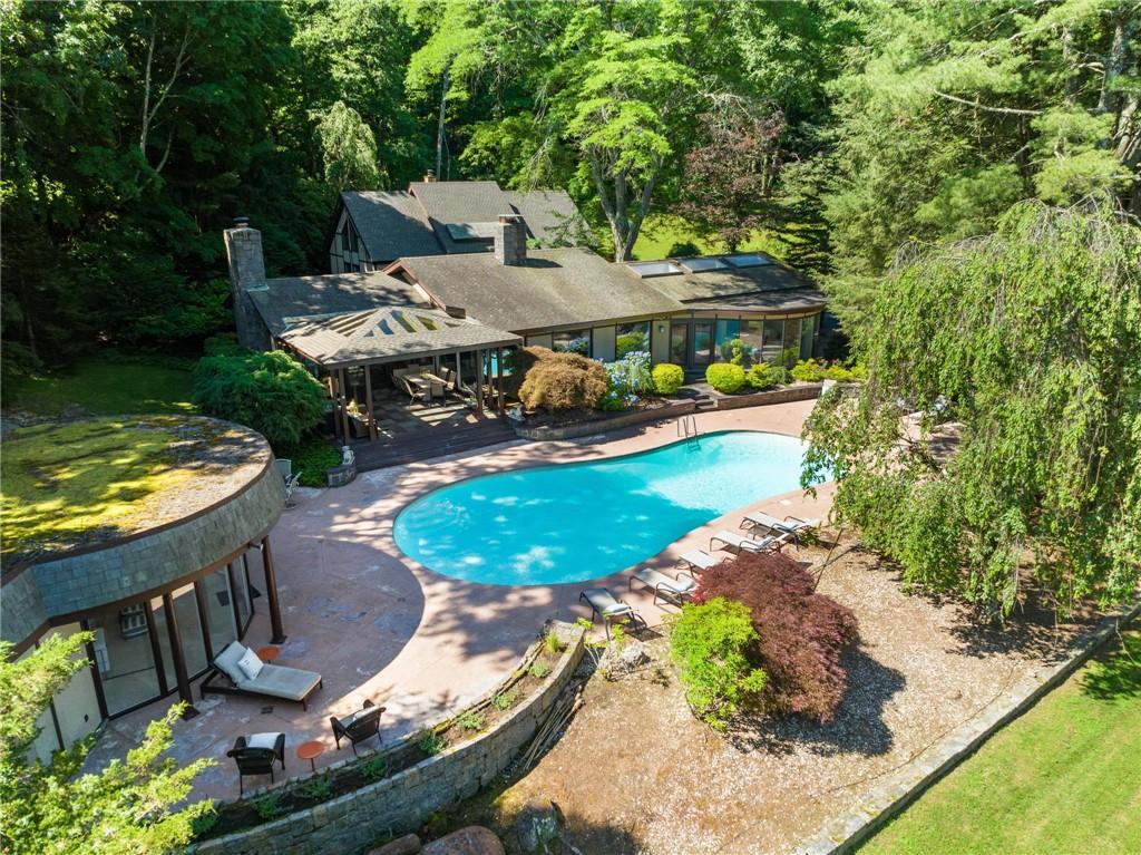 660 Quaker Road Chappaqua, NY 10514 - Photo 1 of 1 Welcome to 660 Quaker Rd, mid century modern mini-estate with pool/pool house/tennis