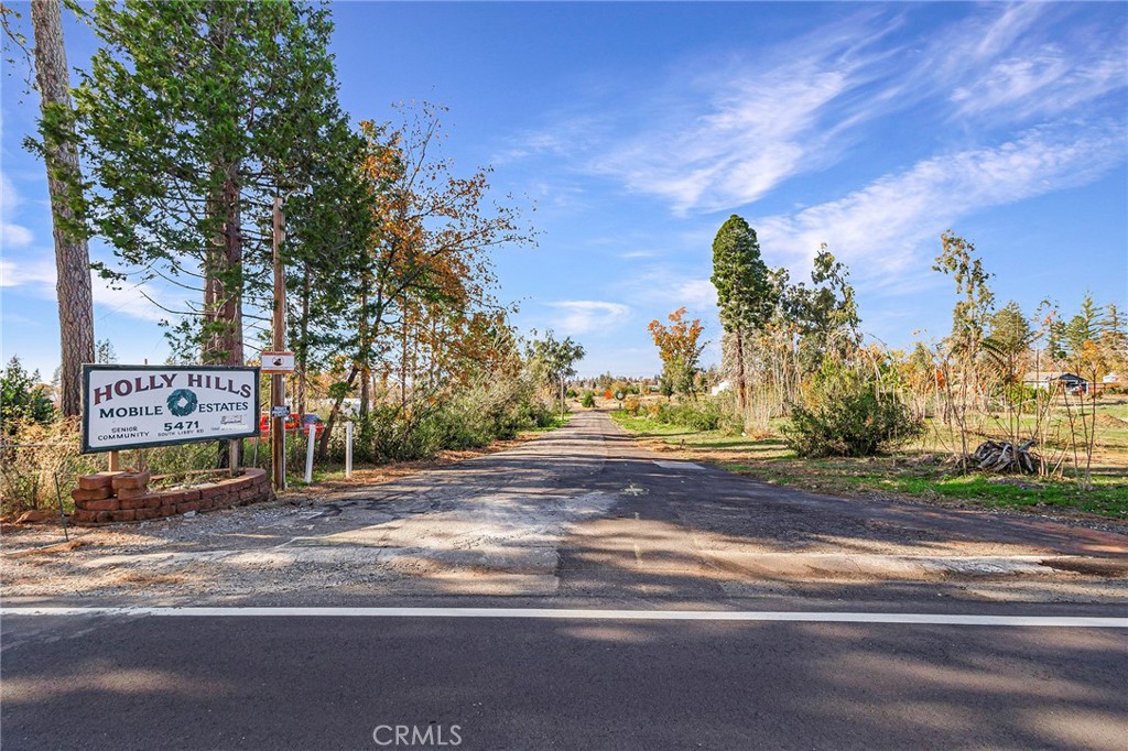 5471 South Libby Road Paradise, CA 95969 - Photo 2 of 21 a sign board on the side of a street