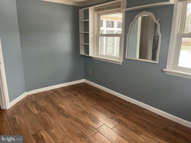 100 Errickson Avenue Moorestown, NJ 08057 - Photo 17 of 27 a view of empty room with wooden floor and fan