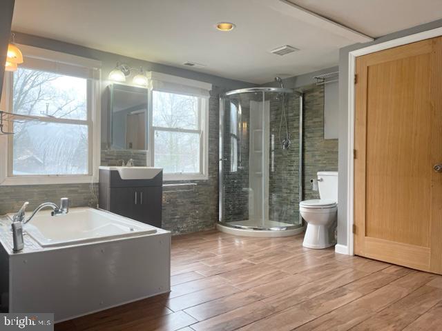 100 Errickson Avenue Moorestown, NJ 08057 - Photo 26 of 27 a spacious bathroom with a bathtub shower and sink
