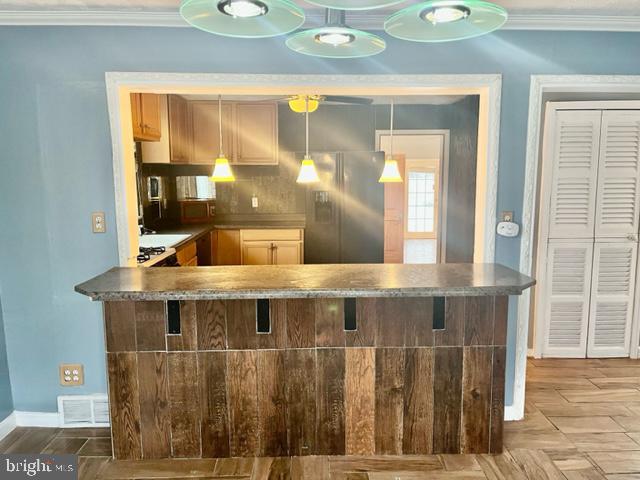 100 Errickson Avenue Moorestown, NJ 08057 - Photo 3 of 27 a bathroom with a granite countertop sink a mirror and shower