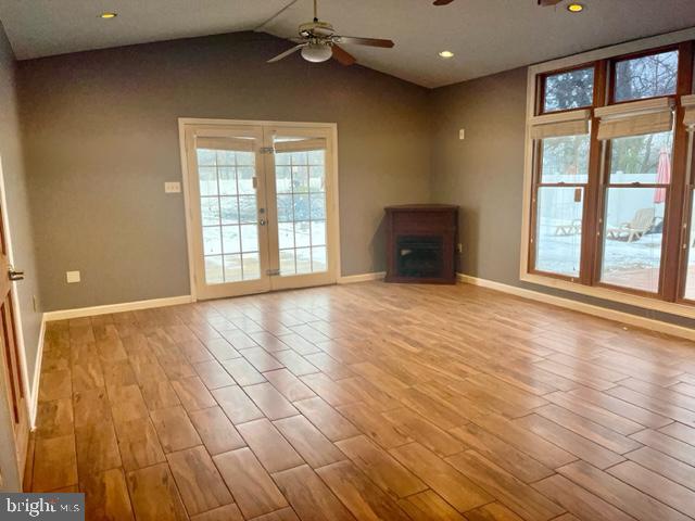100 Errickson Avenue Moorestown, NJ 08057 - Photo 5 of 27 a view of an empty room with a window and wooden floor