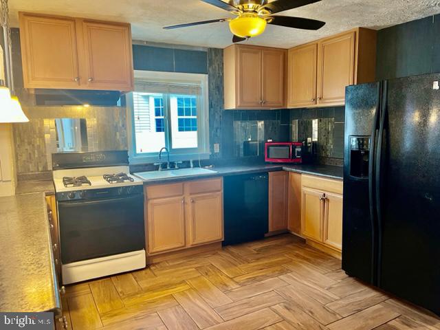 100 Errickson Avenue Moorestown, NJ 08057 - Photo 7 of 27 a kitchen with stainless steel appliances granite countertop a stove a sink and a refrigerator