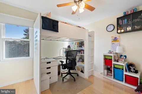 a view of a workspace with furniture