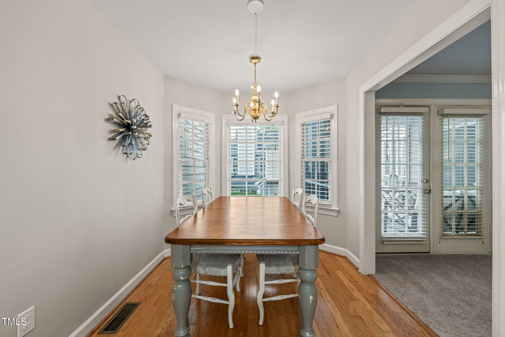 2102 Trailridge Court Raleigh, NC 27603 - Photo 12 of 28 a view of a dining room with furniture and window