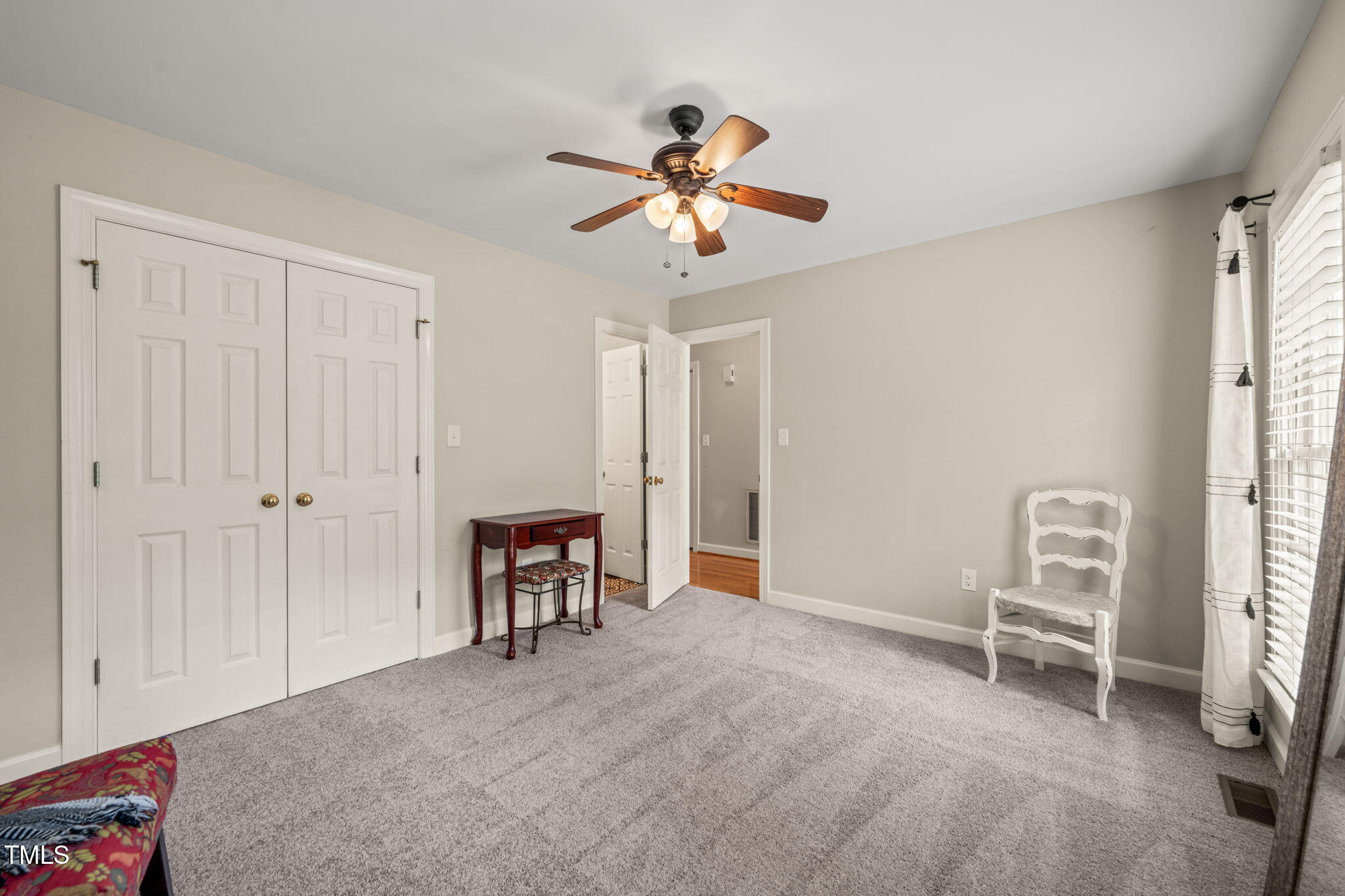 2102 Trailridge Court Raleigh, NC 27603 - Photo 6 of 28 a view of a livingroom with a chandelier furniture and windows