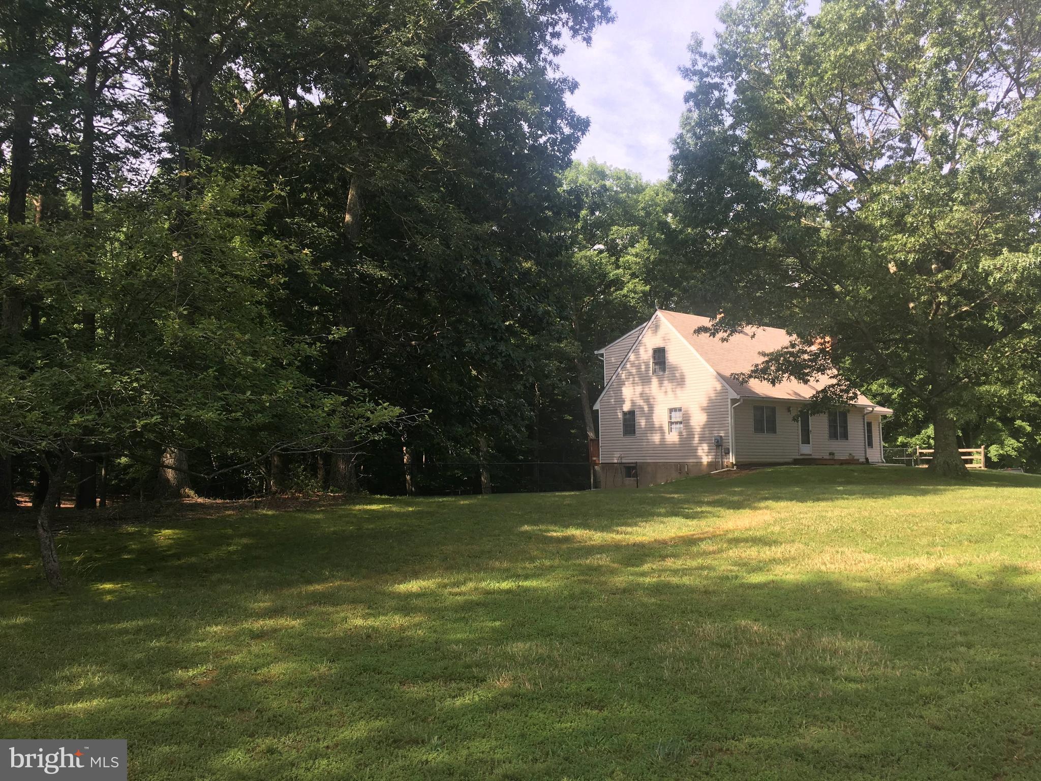 4 Bedroom Cape Cod Home on over 4 Acres!