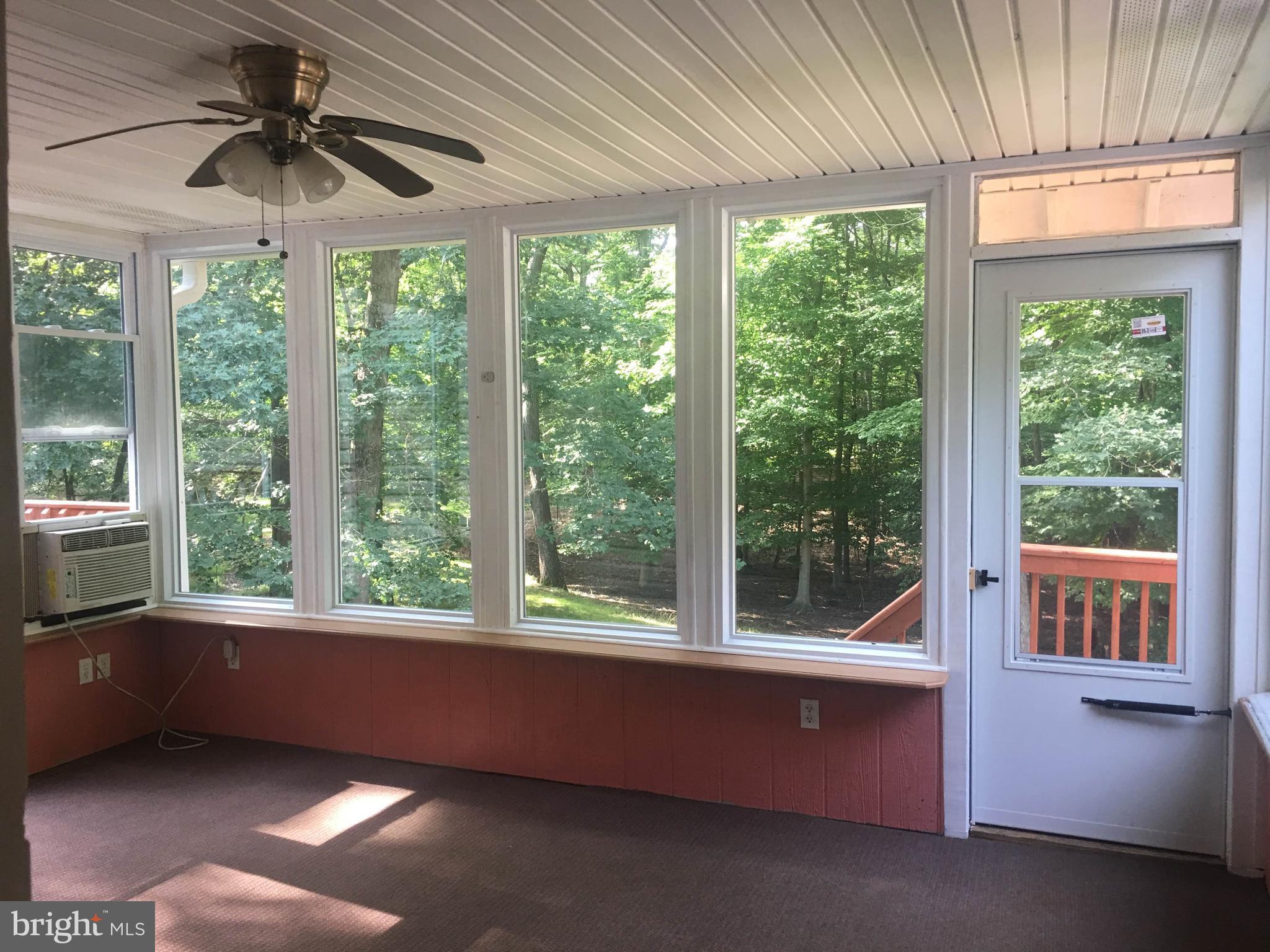 7020 Rison Drive Indian Head, MD 20640 - Photo 12 of 25 Beautiful Enclosed Back Porch Overlooking Property
