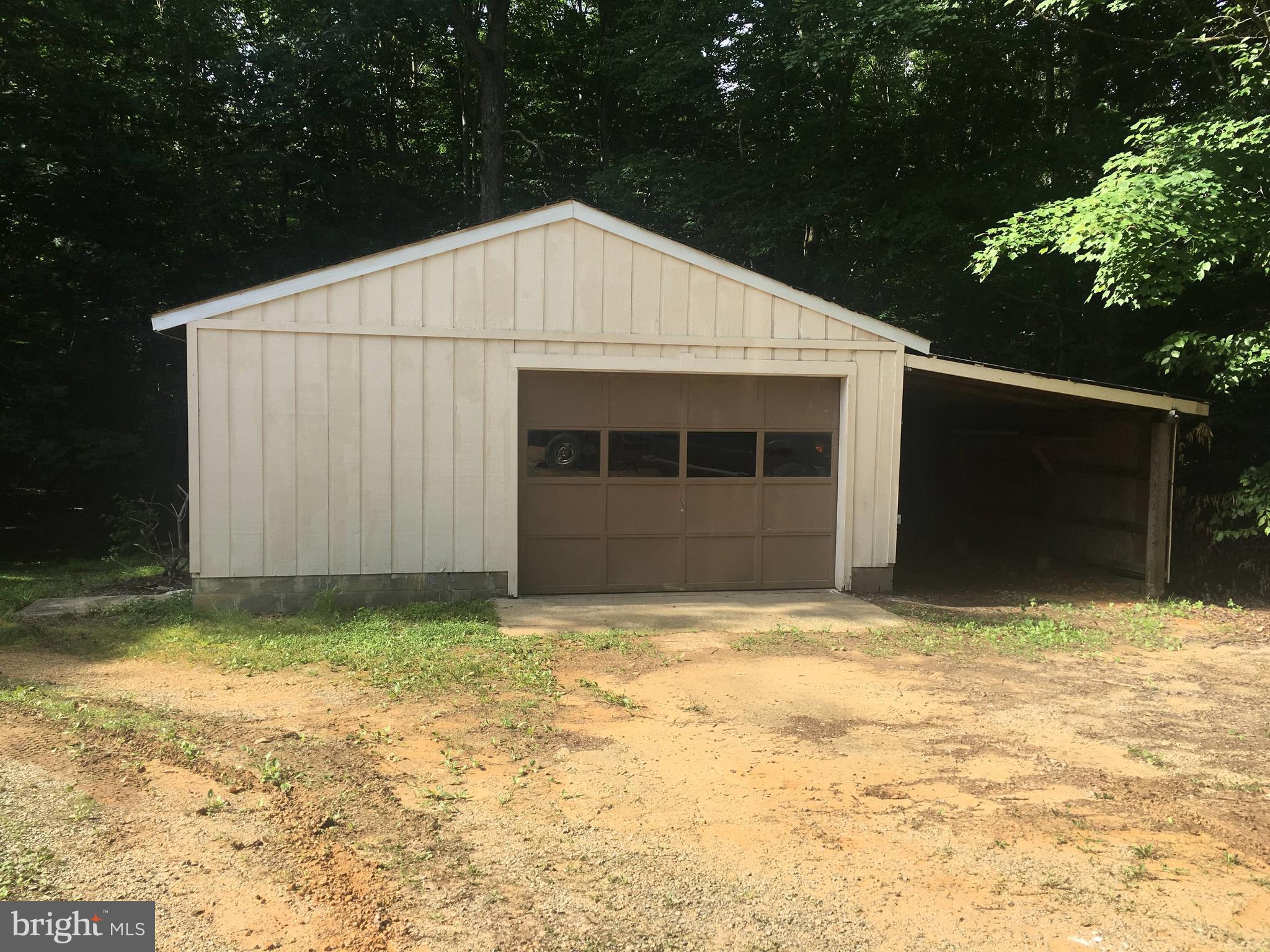 7020 Rison Drive Indian Head, MD 20640 - Photo 16 of 25 Garage with workshop - Electric and Water