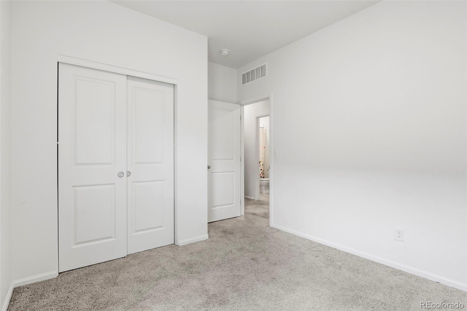 311 Maple Street Bennett, CO 80102 - Photo 27 of 35 a view of an empty room