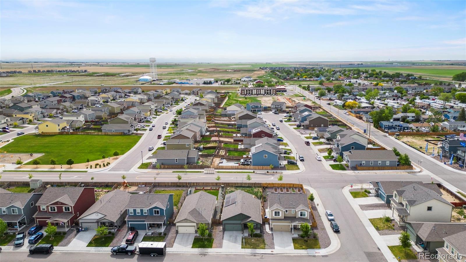 311 Maple Street Bennett, CO 80102 - Photo 34 of 35 an aerial view of residential building and ocean