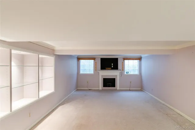 a bathroom with a sink toilet and mirror