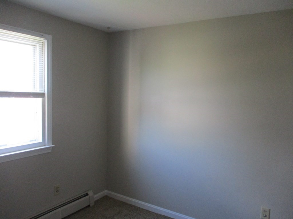 2 Tuck Farm Road, Unit 5 Auburn, MA 01501 - Photo 10 of 11 a small space with a window
