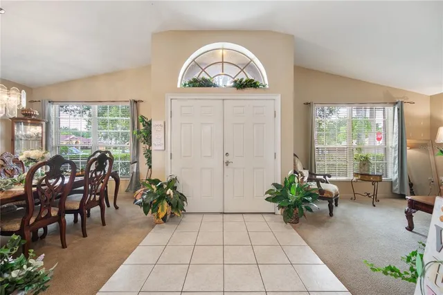 a view of a livingroom with furniture and garden