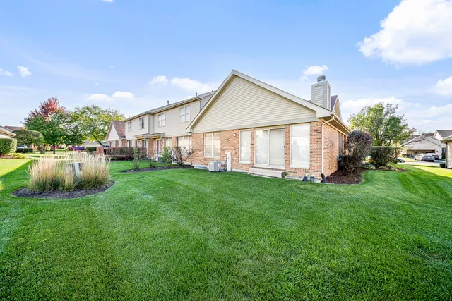 a view of a porch in front of house