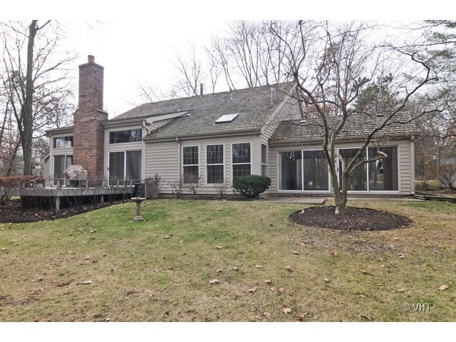 721 Rockefeller Road Lake Forest, IL 60045 - Photo 10 of 10 a backyard of a house with barbeque oven