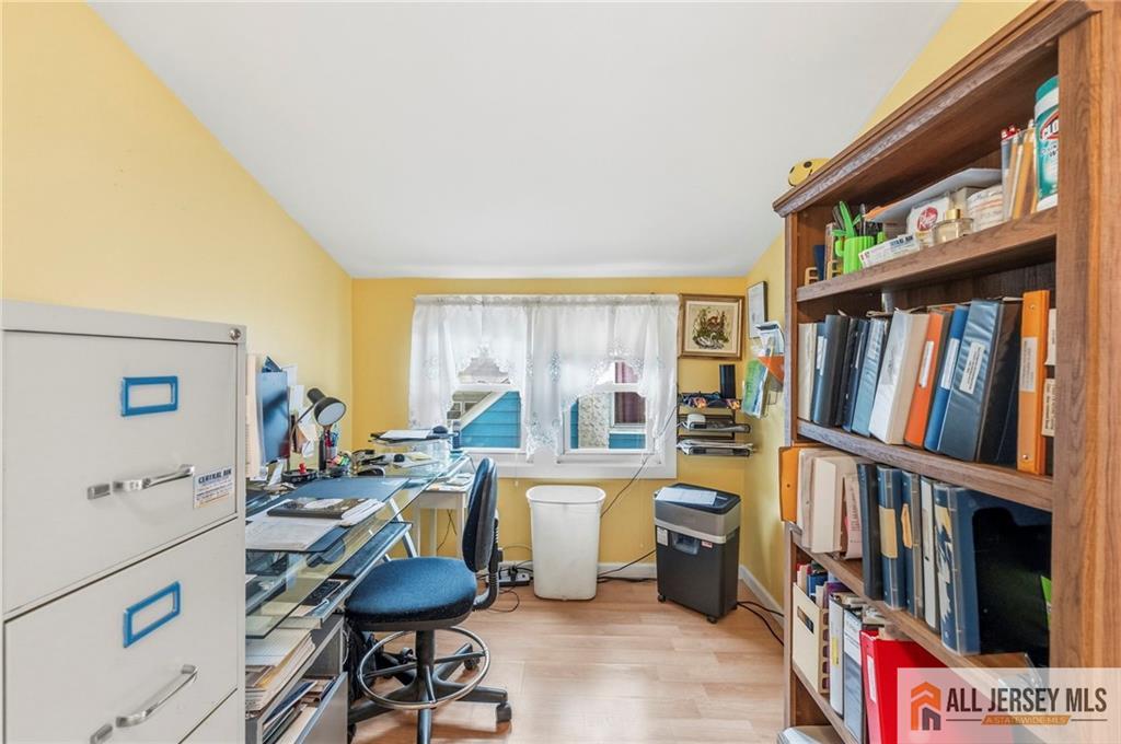 50 3rd Street Fords, NJ 08863 - Photo 21 of 36 a room with lots of furniture and baby crib